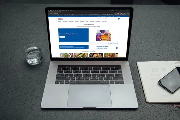 online-retail-laptop-shopping-online-at-Tesco|empty-grocery-shelves-due-to-panic-buying|tesco delivery slots increase to meet demands|twolaptopsv2